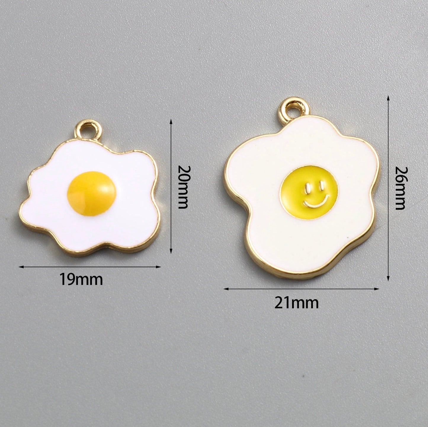 Smiley Faced Egg and Regular Egg Enamel Charm