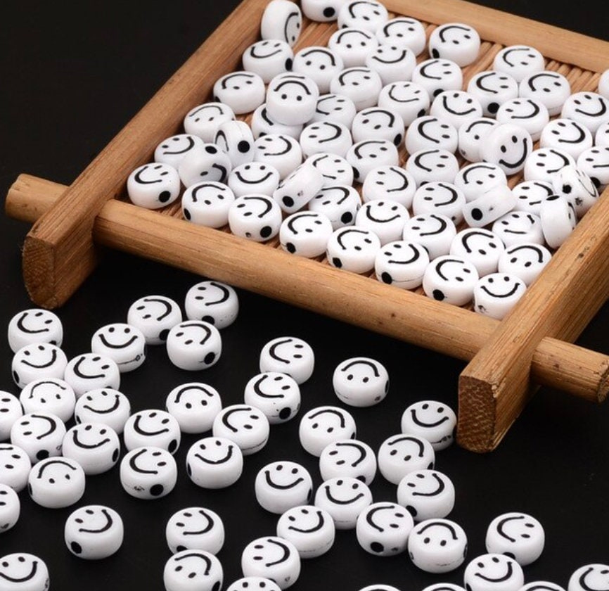 7MM White Flat Round Acrylic with Black Smiley Face Beads