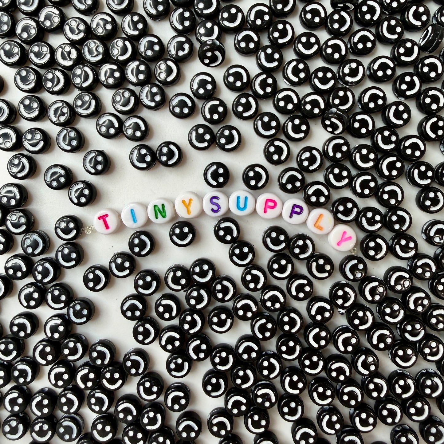7MM Black Flat Round Acrylic with White Happy Face Beads