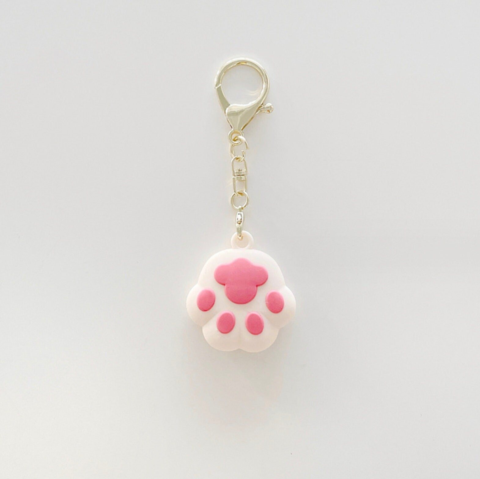 Cute Puffy Paw Themed Silicone AirTag Case (Black, Pink, White)