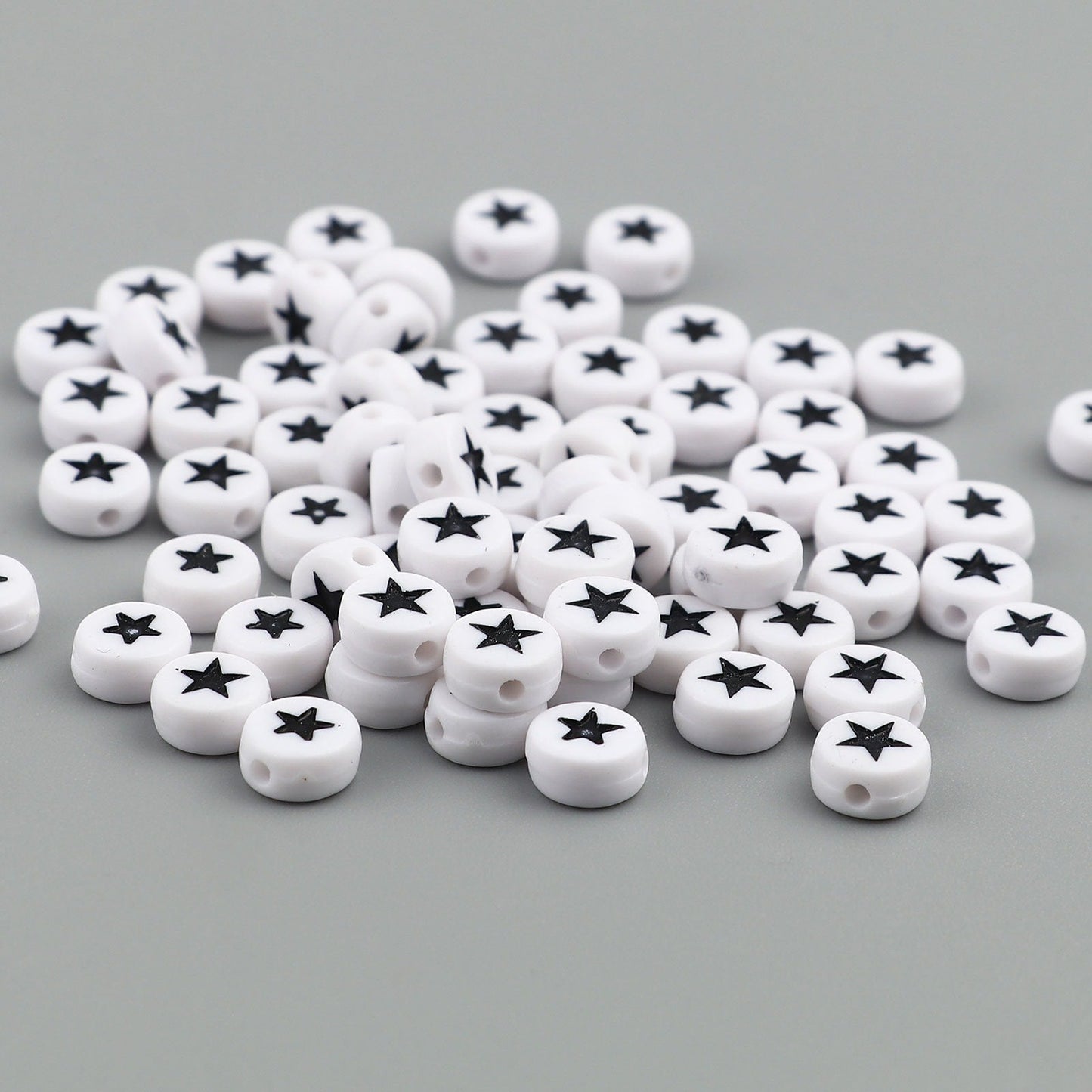 7MM White Flat Round Acrylic with Black Star Beads