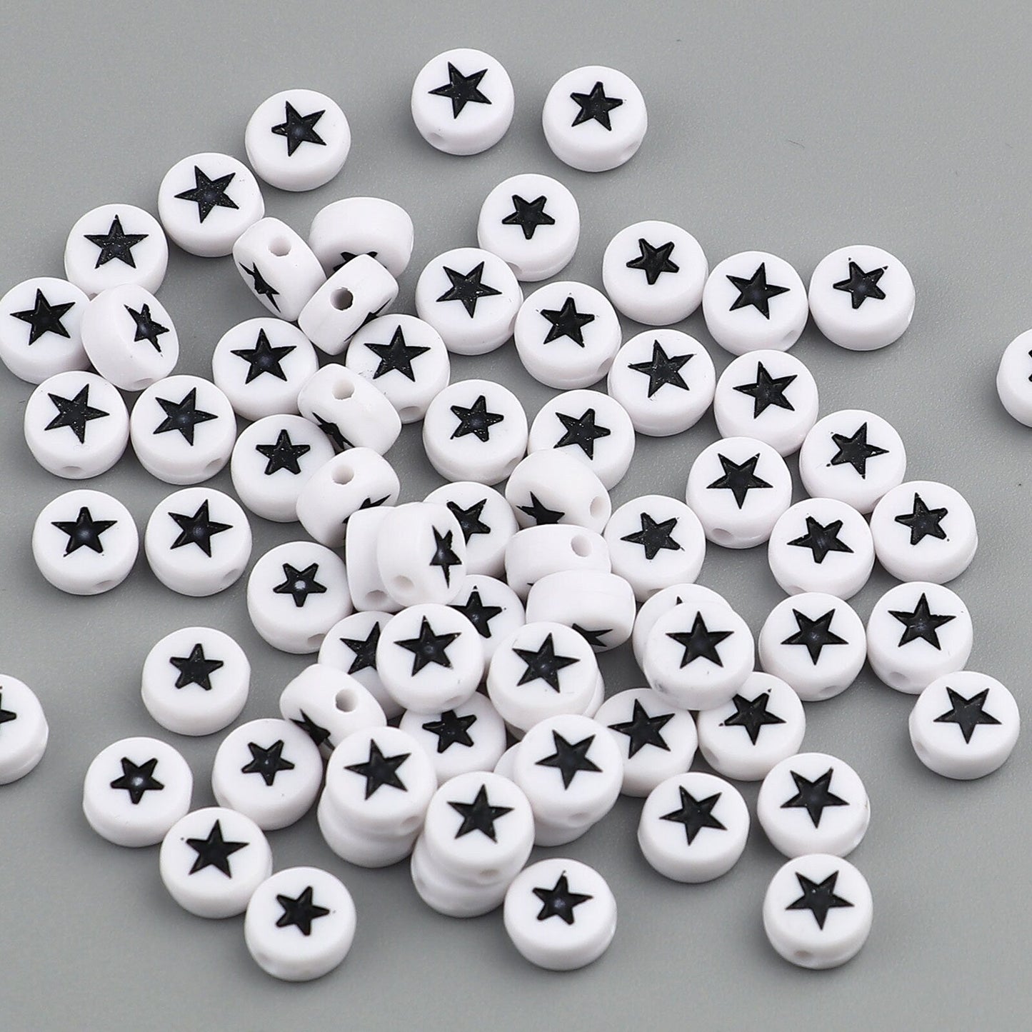 7MM White Flat Round Acrylic with Black Star Beads