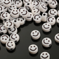 7MM White Flat Round Acrylic with Black Smiley Face Beads