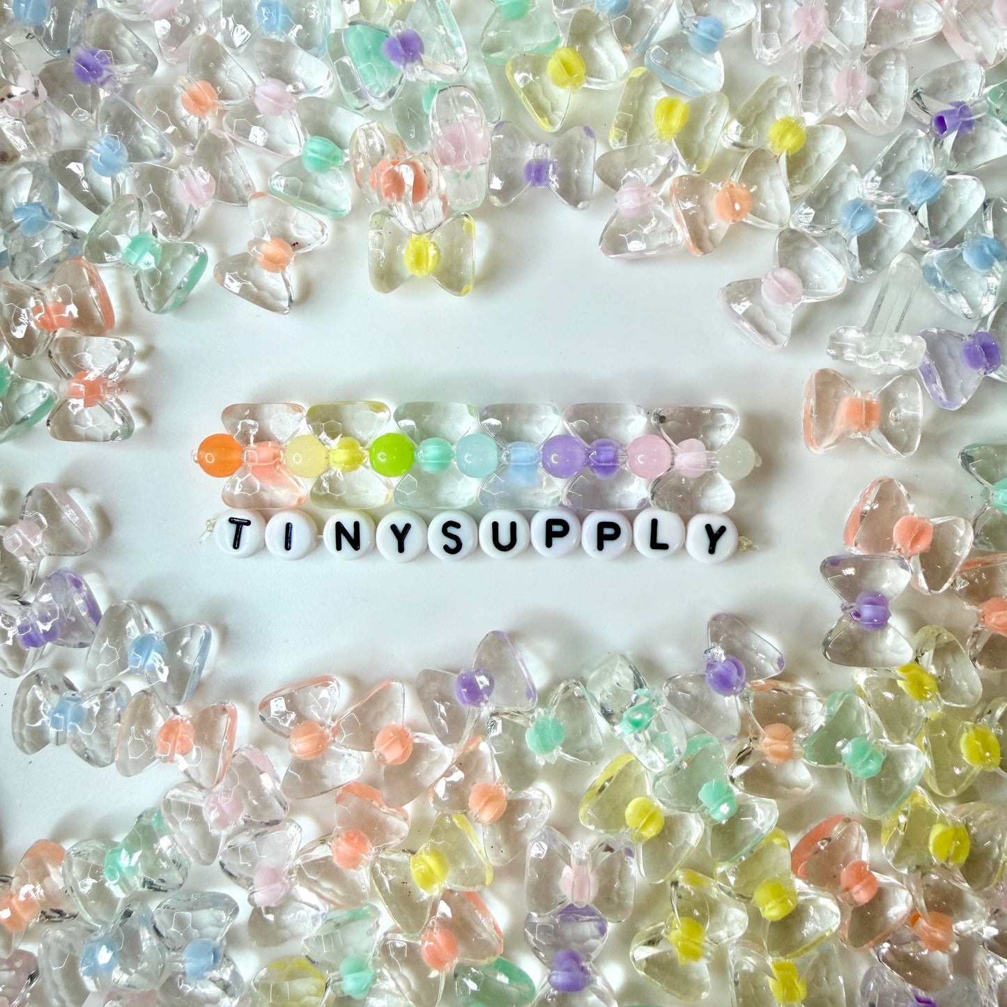 11MM AB Bow Shaped Acrylic Spacer Beads