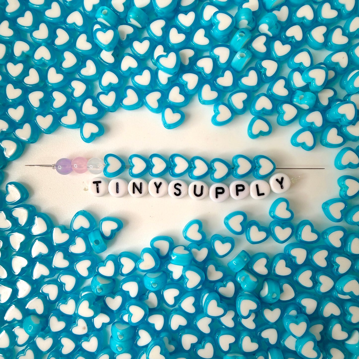 8MM Light Blue Acrylic Heart w/White Middle Spacer Beads with Vertical Hole