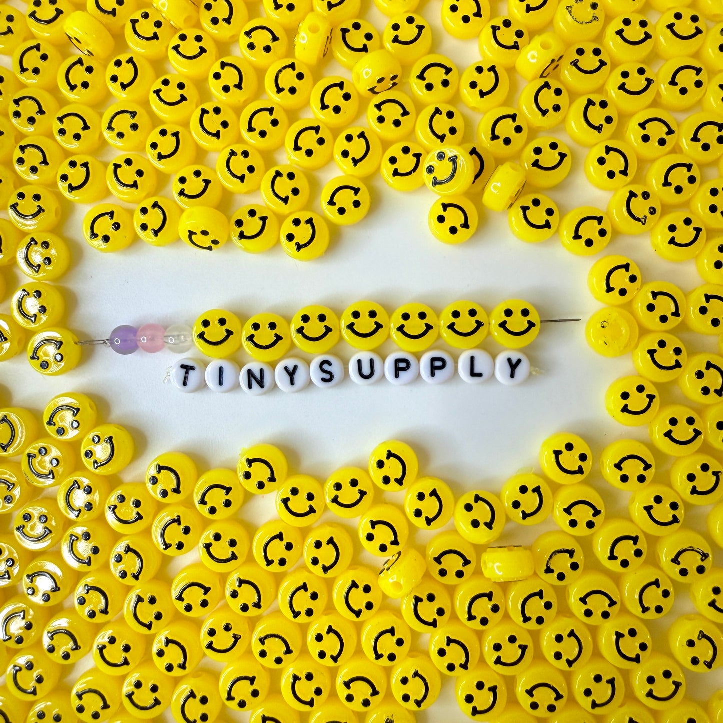 10MM x 6MM Rainbow Beads with Black Happy Face Beads
