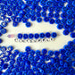 10MM x 6MM Rainbow Beads with Black Happy Face Beads