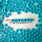 10MM x 6MM Rainbow Beads with Black Happy Face Beads