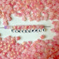 8.5MM Opaque Light Pink Gold Specks Glass Star Beads (AB11)
