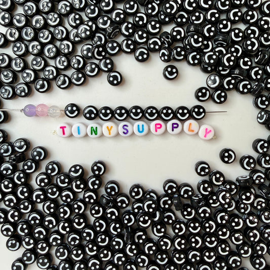 7MM Black Flat Round Acrylic with White Happy Face Beads