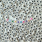 7MM White Flat Round Acrylic with Black Star Beads