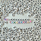 7MM White Flat Round Acrylic with Black Star Beads