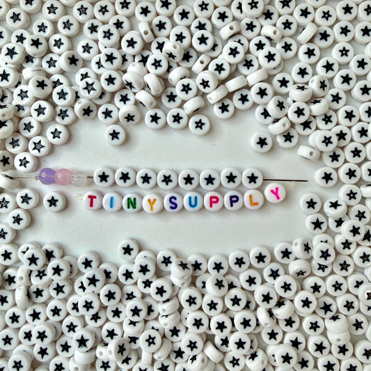 7MM White Flat Round Acrylic with Black Star Beads