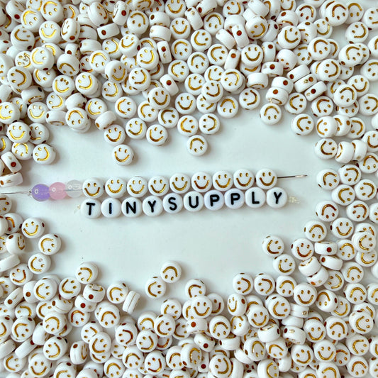 7MM White Flat Round Acrylic with Gold Happy Face Beads