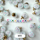 Transparent Glass Orb with Plastic Star Confetti Flakes (21.5mm x 16mm)