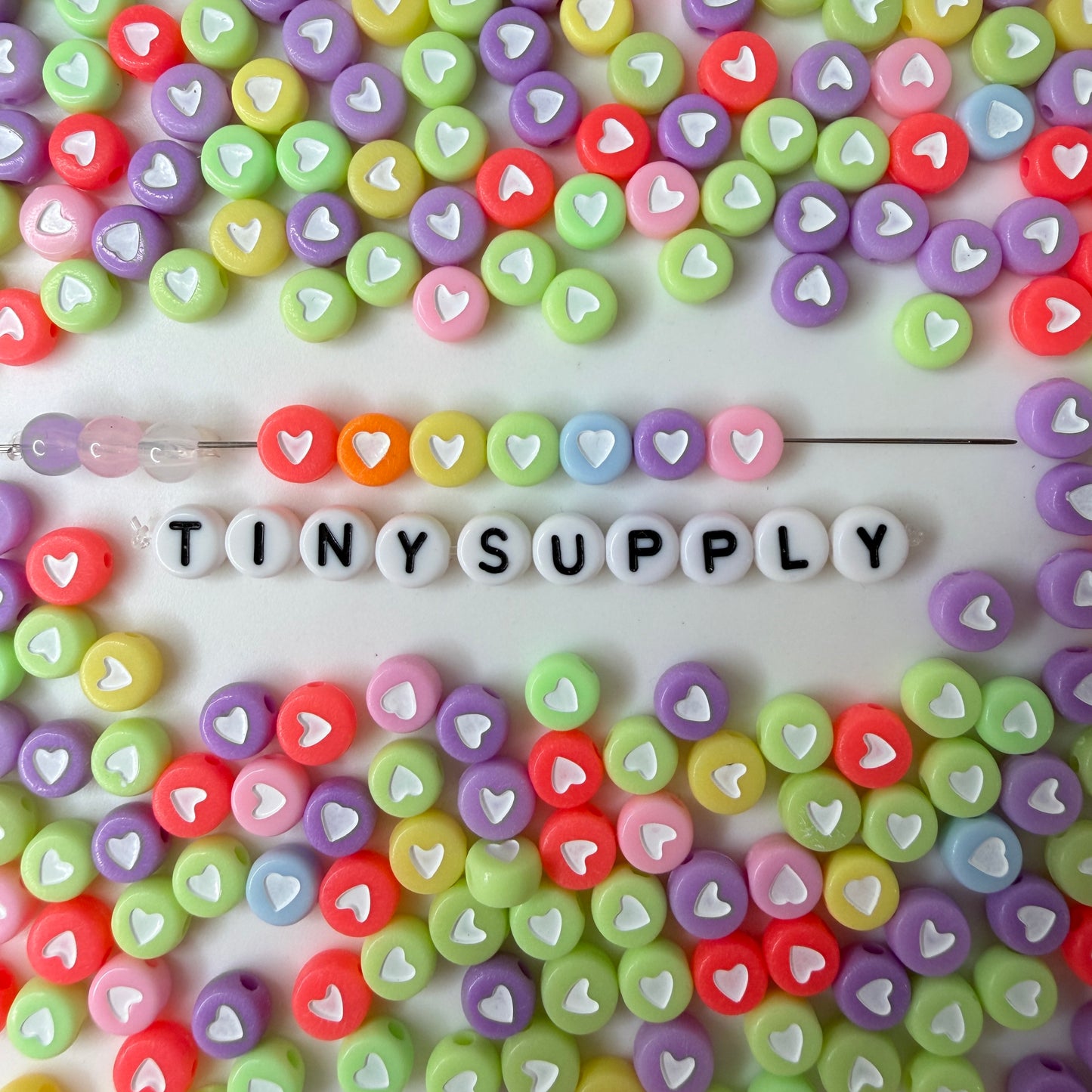 7MM Mixed Color Acrylic Flat Round Beads with White Hearts