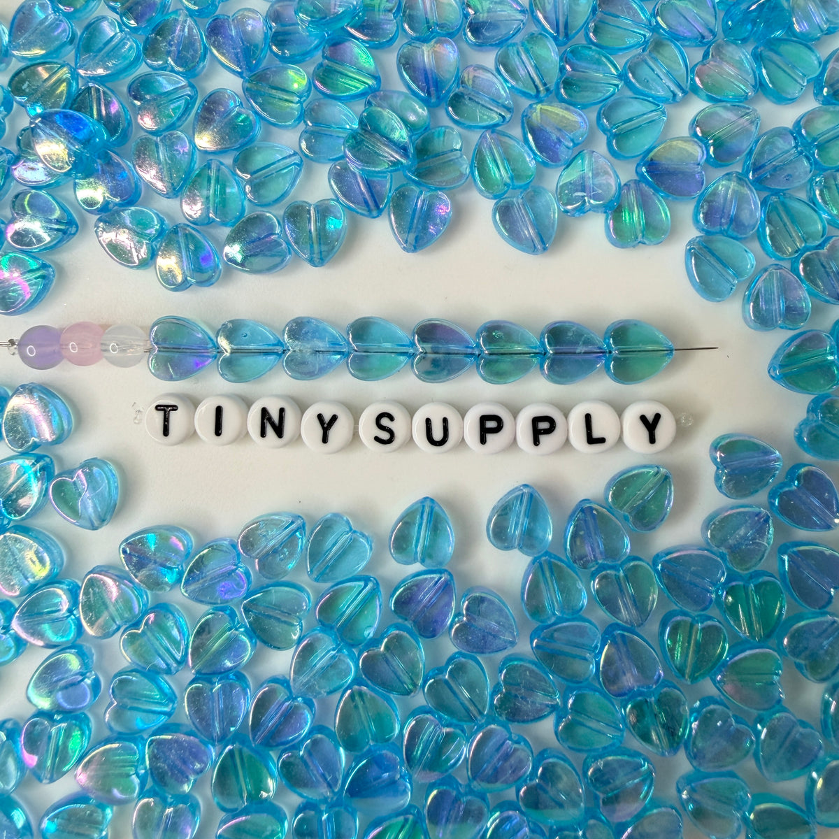 8MM Blue Transparent Acrylic Heart Spacer Beads with Vertical Hole