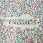 7MM White Flat Round Acrylic with Mixed Faces Beads