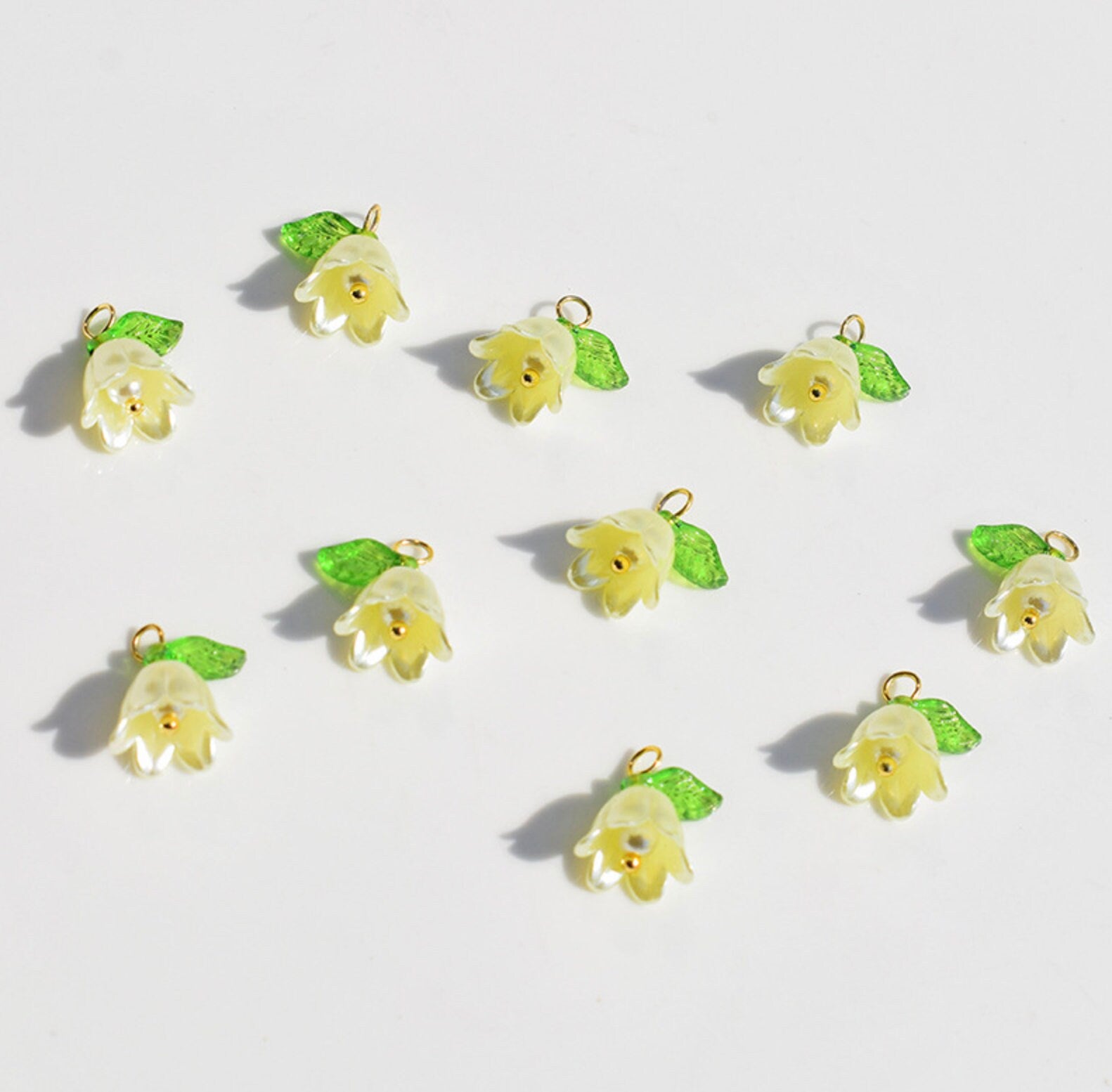 14MM x 11MM Acrylic Flower with Leaf Charms (White, Purple, Yellow, Pink, Light Purple, Green)